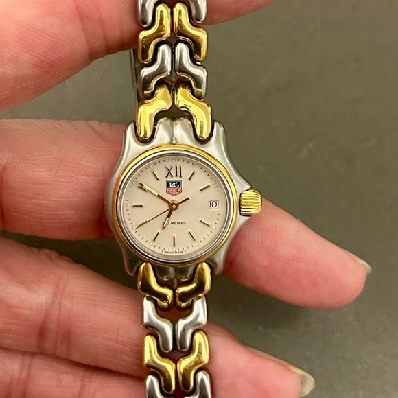 Tag Heuer Jewelry - Women’s Tag Heuer gold and silver watch with pearl/white face.